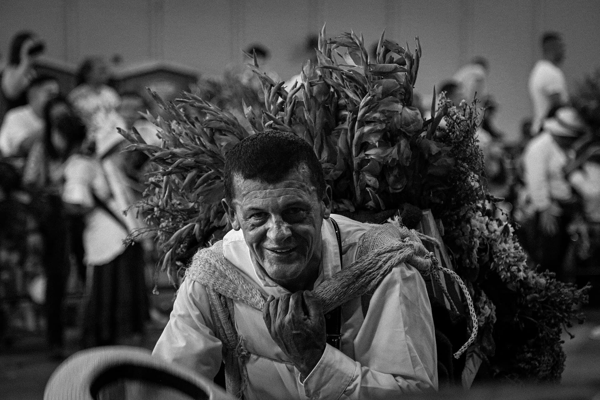 The flower fair in Medellin is a fundamental cultural element to maintain a close connection between the city and the countryside. starring the emblem