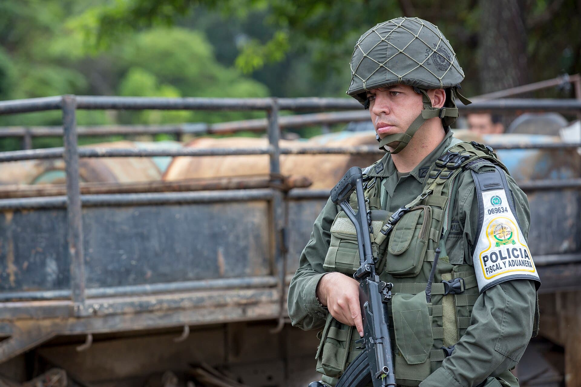 Police soldier guarding Colombian side of Simón Bolívar International Bridge.