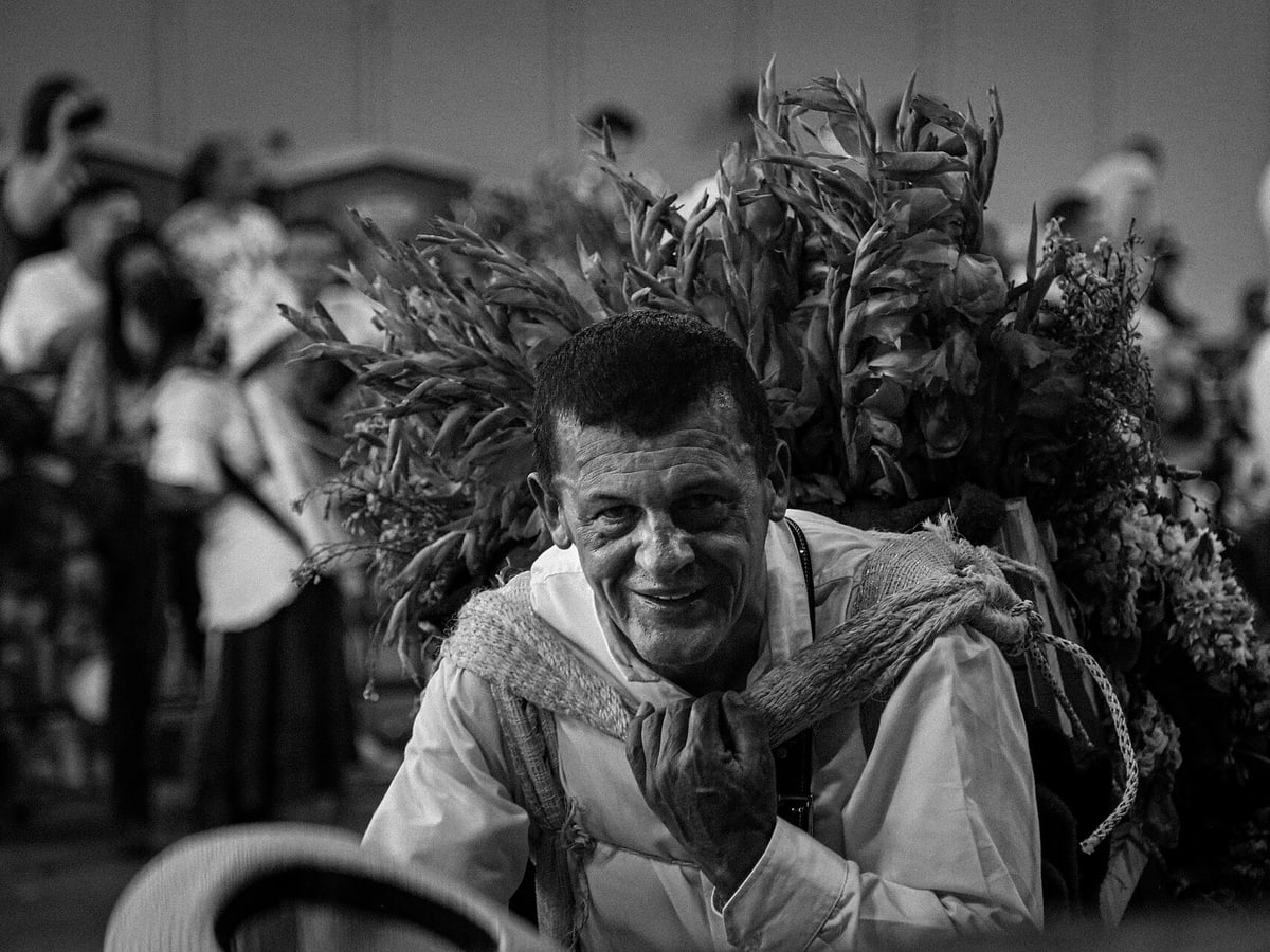 The flower fair in Medellin is a fundamental cultural element to maintain a close connection between the city and the countryside. starring the emblem